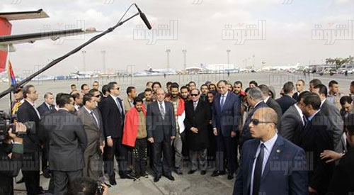السيسي يستقبل العائدين من ليبيا - تصوير: احمد عبد اللطيف
