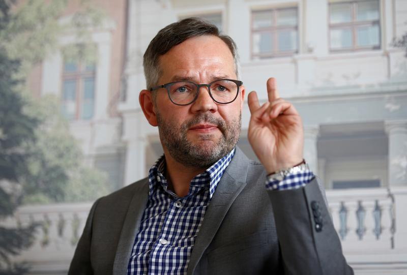 الصحفى دينيز يوجيل