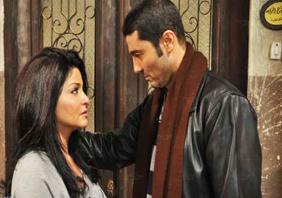 خالد النبوي وعلا غانم في مشهد من مسلسل (ابن موت)