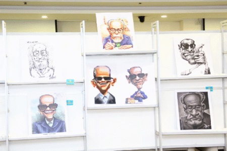 رسوم نجيب محفوظ الكاريكاتيرية تزين معرض القاهرة للكتاب 