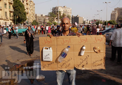 المصريين يأملون في تحسين الوضع الاقتصادى بعد مرسى - تصوير :علي هزاع