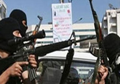 ملثمين باسلحة نارية - ارشيفية