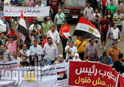 مسيرة في شارع البطل أحمد عبد العزيز في طريقها للتحرير   تصوير: روجيه أنيس