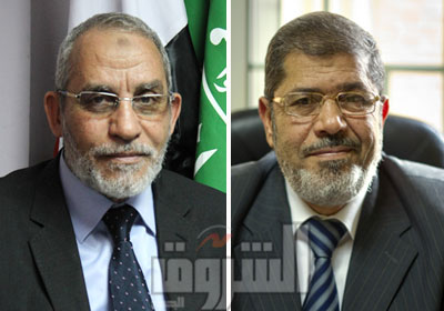 محمد مرسي رئيس الجمهوريه  ومحمد بديع المرشد العام لجماعة الإخوان المسلمين