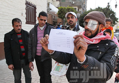 احتجاجات المصابين لا تتوقف    تصوير: جيهان نصر