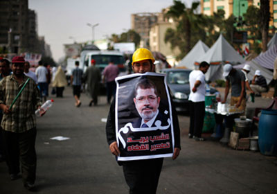 متظاهرو رابعة العدوية يواصلون اعتصامهم لليوم الرابع تأييدا للرئيس مرسي 1 Protesters rabaa el Adaweya 1611