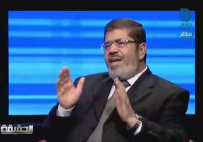 الدكتور محمد مرسي- رئيس حزب الحرية والعدالة الذراع السياسي لجماعة الإخوان المسلمين