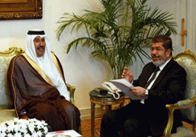 جانب من لقاء الرئيس مرسي مع الشيخ حمد بن جاسم رئيس وزراء قطر