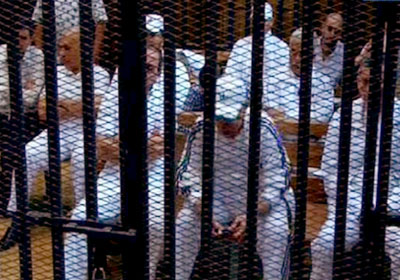 المتهمين في أحداث مجزرة بورسعيد في قفص الاتهام بأكاديمية الشرطة
