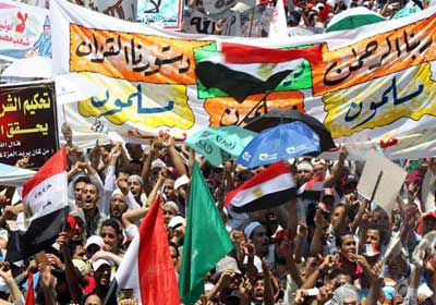 واشنطن بوست: فوز مرسي بالرئاسة يعني استئثار الجماعة الإسلامية بالسلطة في البلاد