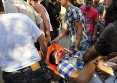 اعتداء انصار الاخوان على احد طواقم العمل التيلفزيونى خلال تغطية احد المظاهرات ارشيفية