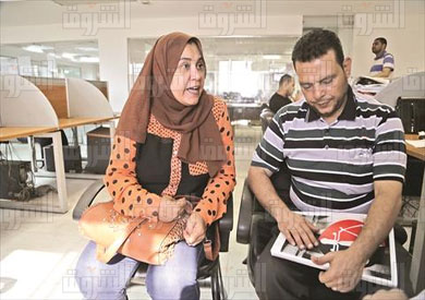 المحامي وزوجته- تصوير أحمد عبد الجواد