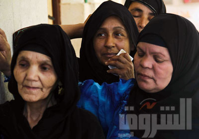 ناخبات ينتظرن دورهن للإدلاء بأصواتهن في أحدي لجان بني سويف             تصوير: روجيه أنيس