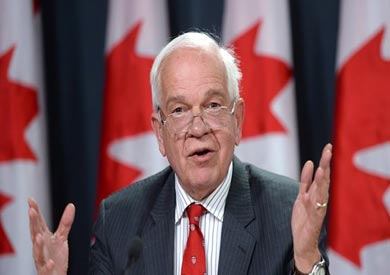 وزير الهجرة الكندي جون ماكالوم