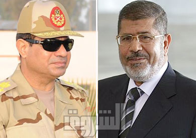 الرئيس المعزول محمد مرسي والفريق أول عبد الفتاح السيسي