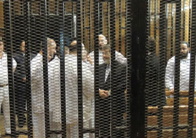 الرئيس المعزول محمد مرسي في قفص الاتهام - صورة أرشيفية