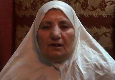 والدة الناشط أحمد عرفة
