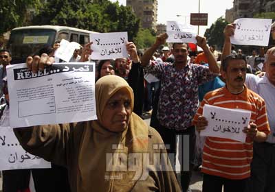نشطاء تمرد بالسيدة زينب فى مسيرة الأسبوع الماضى تصوير  على هزاع