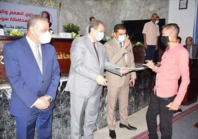 وزير القوى العاملة ومحافظ سوهاج