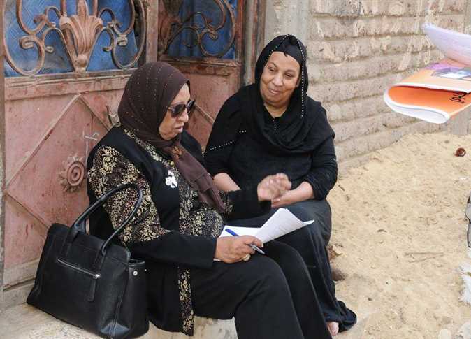 أثناء حملة التوعية للسيدات بالمحافظات
