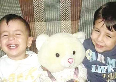 إيلان كردي وشقيقه الأكبر