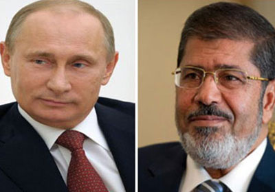 الرئيس محمد مرسي وفلاديمير بوتين الرئيس الروسي