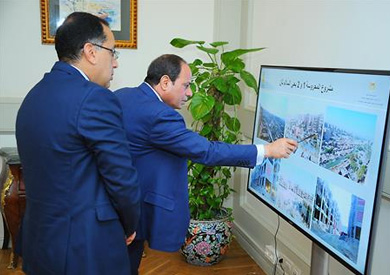 السيسي ووزير اﻹسكان