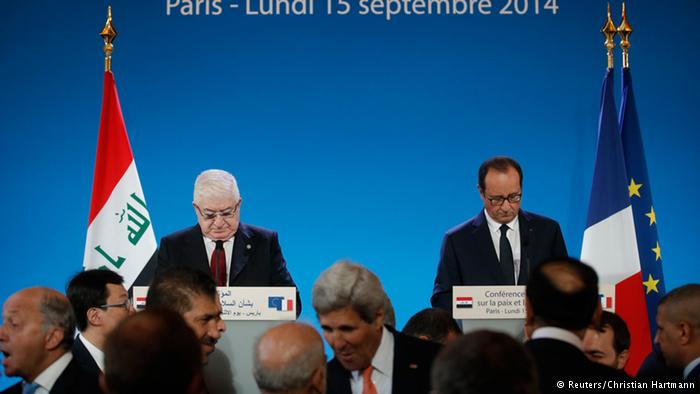 الرئيسين العراقي والفرنسي لدى افتتاح مؤتمر باريس