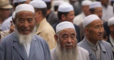 الصين تعرض مكافأة لمن يبلغ عن شاب ملتحٍ أو امرأة منتقبة في شينجيانج