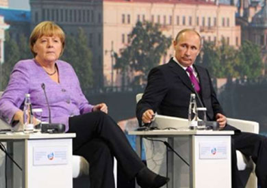 فلاديمير بوتين و ميركل