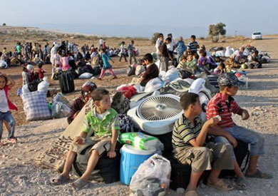لاجئين سوريين على الحدود التركية