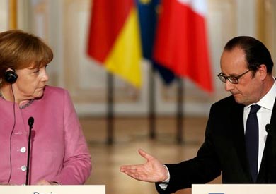 ميركل وأولاند