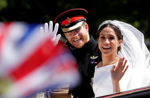 الأمير البريطاني هاري وزوجته ميجان في حفل زفافهما بصورة من أرشيف رويترز.