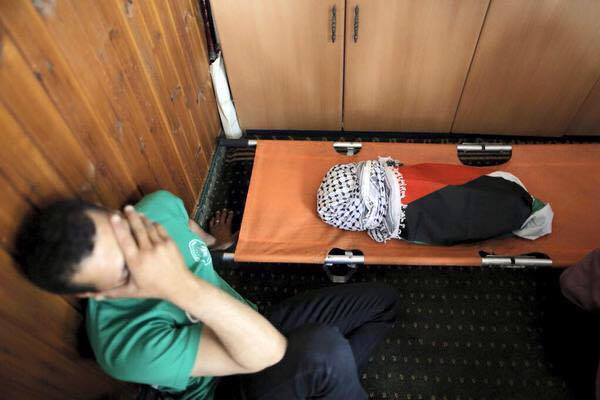 جثة الرضيع الفلسطيني الشهيد علي دوابشة